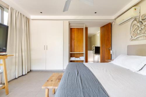 En eller flere senge i et værelse på Amanecer en Chacras