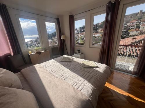 Postel nebo postele na pokoji v ubytování Apartments Misa Lake View