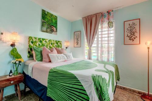 Postel nebo postele na pokoji v ubytování LoveSoulBeautiful Luquillo