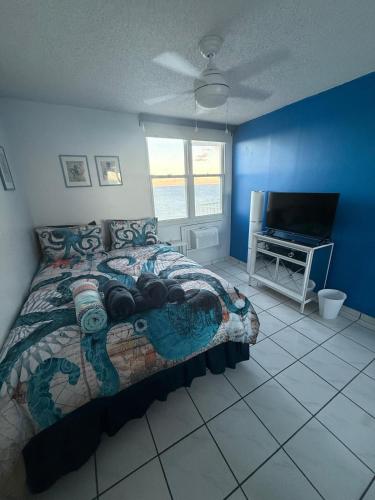 Katil atau katil-katil dalam bilik di Luquillo Ocean View Paradise