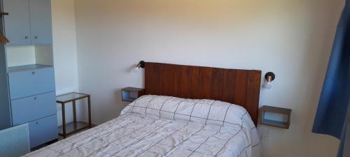 Postel nebo postele na pokoji v ubytování Cabaña La Reserva de la Albufera