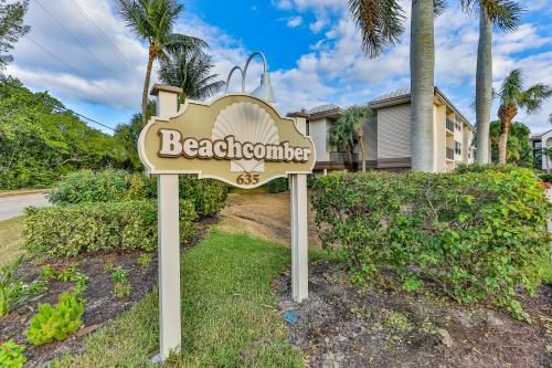 a sign for a beachside entrance in front of a house at Beachcomber A101 in Sanibel