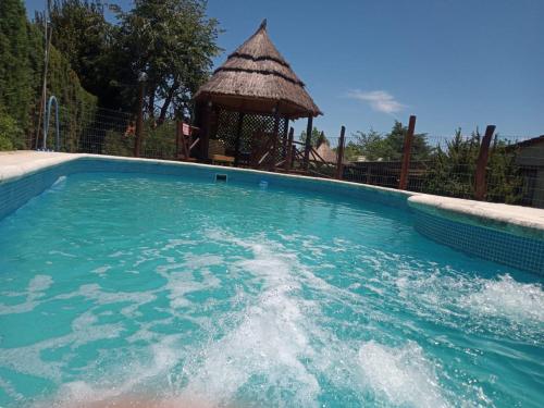 Πισίνα στο ή κοντά στο Cabañas del IntiCo