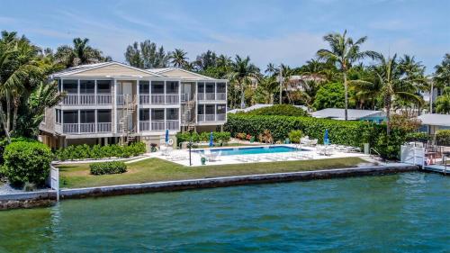 an exterior view of a house on the water at Captiva Hide A Way 2B in Captiva
