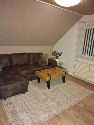 Uma área de estar em Holiday Nest 2