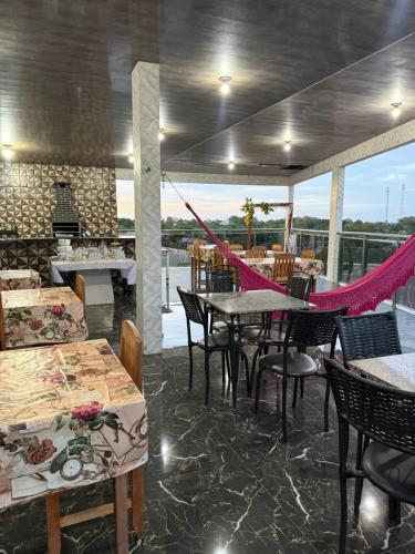 Restoran või mõni muu söögikoht majutusasutuses Caribe de Alter - Hotel & Pousada