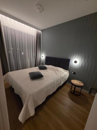 Ένα ή περισσότερα κρεβάτια σε δωμάτιο στο Omega Lake Family 2