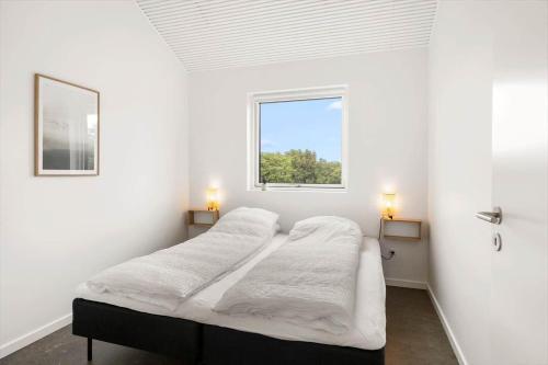 Un pat sau paturi într-o cameră la 279-Harboore-Neerlandiavej-72