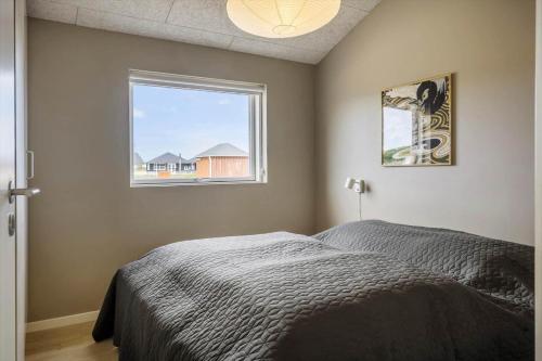 Ένα ή περισσότερα κρεβάτια σε δωμάτιο στο 387-Harboore-Charlottevej-11-A