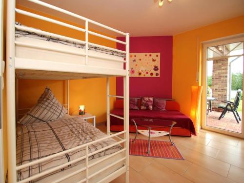 En eller flere senge i et værelse på Appartementhaus am Kiessee, Westerholt