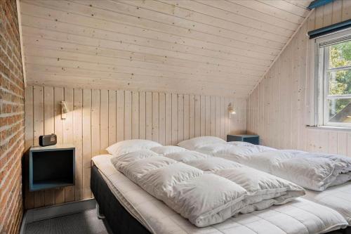 Кровать или кровати в номере 0329-Romo-Langdalsvej-42