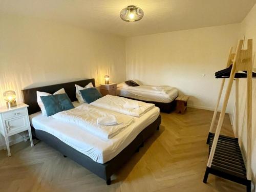 Ένα ή περισσότερα κρεβάτια σε δωμάτιο στο Pleasant apartment near Valkenburg