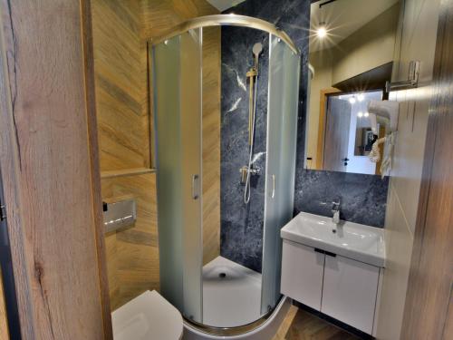 Ένα μπάνιο στο Apartment in Ustronie Morskie by the Beach