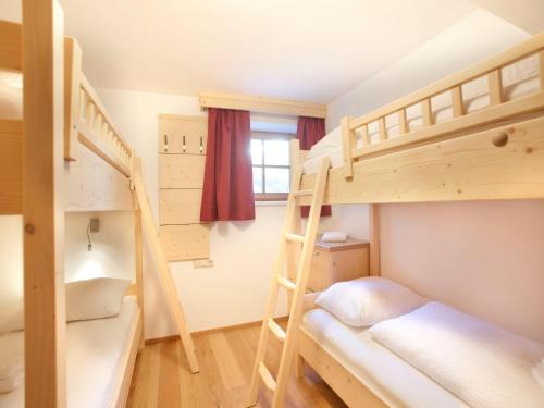 Voodi või voodid majutusasutuse Chalet in Pinzgau near Ski Slopes toas