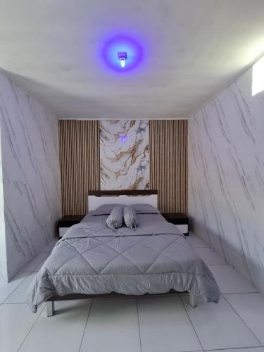 Ένα ή περισσότερα κρεβάτια σε δωμάτιο στο YouYouKe Papillon Santolo