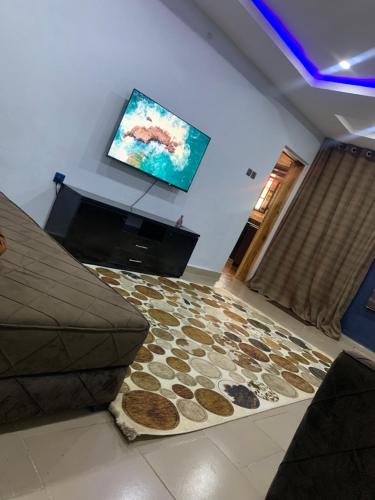 TV a/nebo společenská místnost v ubytování Royal palm Ijapo