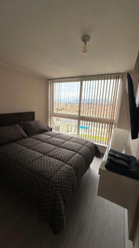 En eller flere senge i et værelse på Barrio Universitario VI