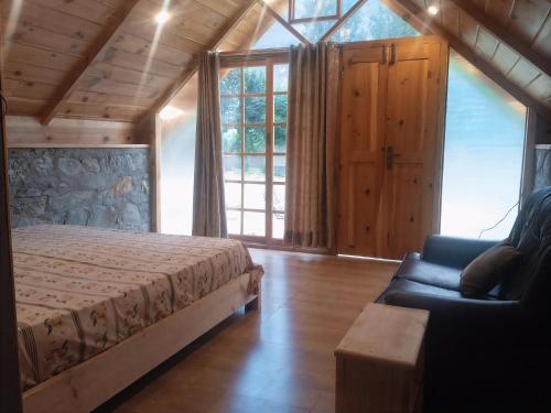 Гостиная зона в Country Club Resorts - Riverside Cottages & Suites