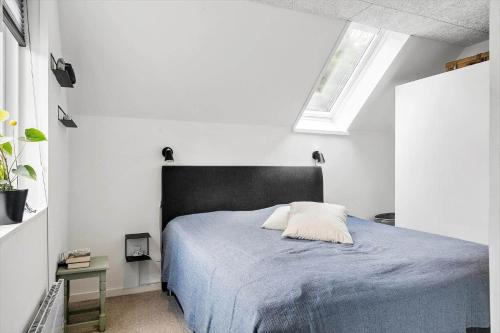 En eller flere senge i et værelse på LF11122-Struer-Plantagevej-22