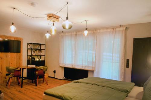 Ένα ή περισσότερα κρεβάτια σε δωμάτιο στο Ferienwohnung Waldgeflüster