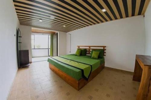 Ένα ή περισσότερα κρεβάτια σε δωμάτιο στο Bee Hive Mountain Villa Residence