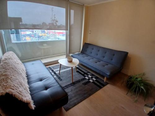 Χώρος καθιστικού στο Departamentos Pehumayen