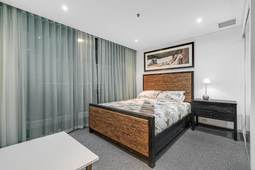 Voodi või voodid majutusasutuse Stylish City Escape! Oaks Horizons toas