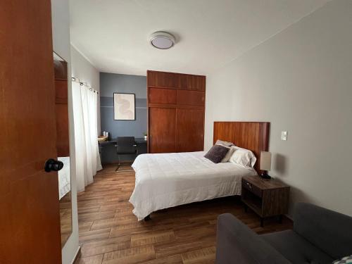 Ένα ή περισσότερα κρεβάτια σε δωμάτιο στο Departamento Nubes