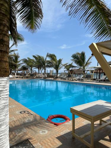 Fotografie z fotogalerie ubytování Waves & Relaxation Elegant 2BR at OceanGreen v destinaci Prampram