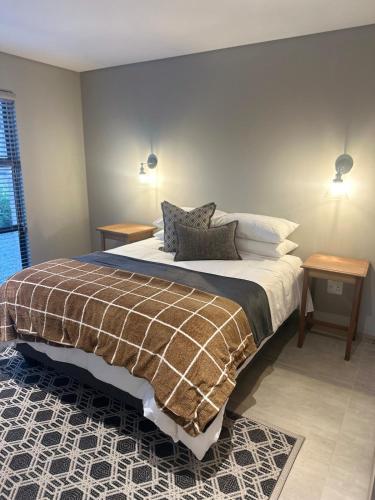 Postel nebo postele na pokoji v ubytování Fallen Oak Villa 2