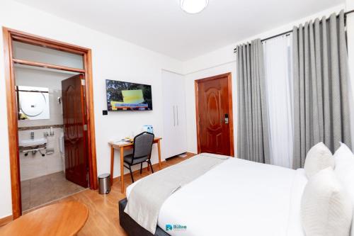 Μια τηλεόραση ή/και κέντρο ψυχαγωγίας στο The Dalton Grand Hotel