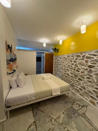 Postel nebo postele na pokoji v ubytování Lonos Circle Terrace view