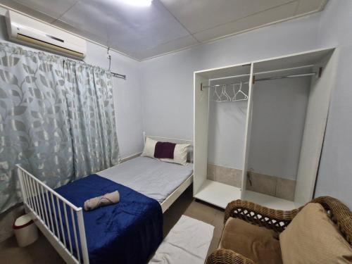 Ένα ή περισσότερα κρεβάτια σε δωμάτιο στο Easygoing