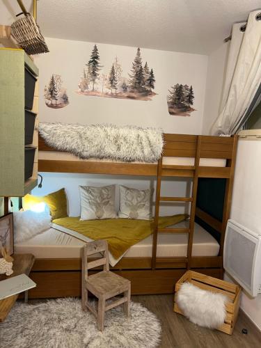 Ένα ή περισσότερα κρεβάτια σε δωμάτιο στο Apart'hôtel 6 personnes centre et cœur station