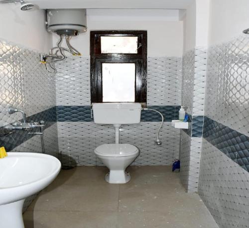 Ένα μπάνιο στο Nigaah Homestay By StayApart