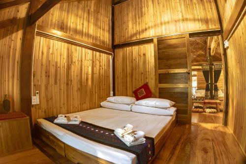 Ένα ή περισσότερα κρεβάτια σε δωμάτιο στο An Station - Dorm & Onsen packaged