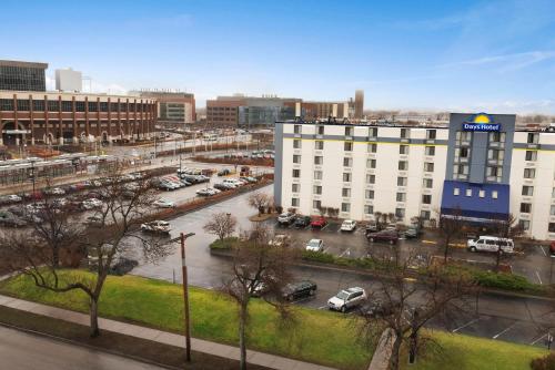 a view of a city with a parking lot at Days Hotel by Wyndham University Ave SE in Minneapolis