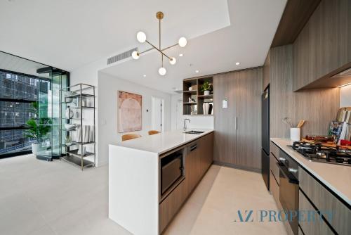 Η κουζίνα ή μικρή κουζίνα στο Prime Location CBD with Pool & Gym