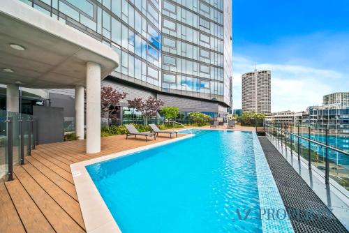 a swimming pool on the roof of a building at Prime Location CBD with Pool & Gym in Perth