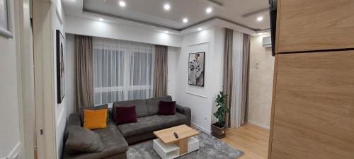 Χώρος καθιστικού στο Extra Apartman