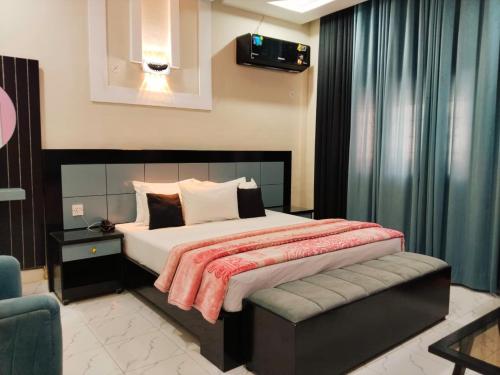 Ένα ή περισσότερα κρεβάτια σε δωμάτιο στο Shelton Elite Hotel