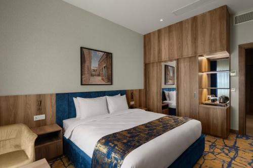 Postel nebo postele na pokoji v ubytování Marion Hotel Erbil