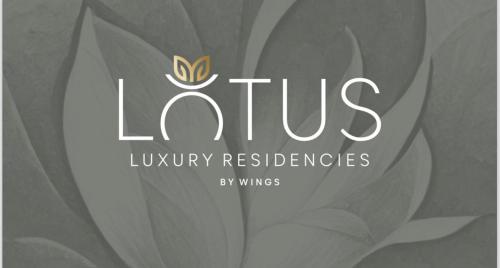 Et logo, certifikat, skilt eller en pris der bliver vist frem på Lotus Luxury Residencies