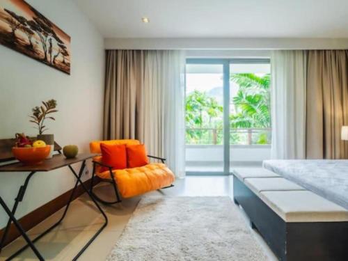 Ένα ή περισσότερα κρεβάτια σε δωμάτιο στο Elegant Beachfront 3BR Condo at Pearl of Naithon