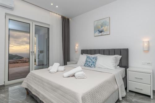 Ένα ή περισσότερα κρεβάτια σε δωμάτιο στο Villa Orizzonte - Ground Floor Apartment