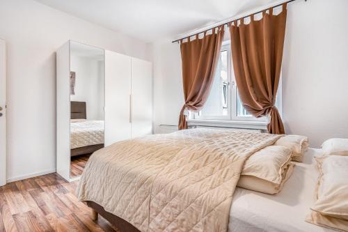 Postel nebo postele na pokoji v ubytování Wohnungen am Hagener Hbf