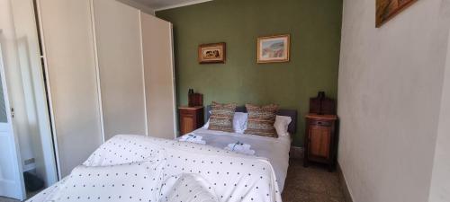 Ένα ή περισσότερα κρεβάτια σε δωμάτιο στο Ca de Franchi