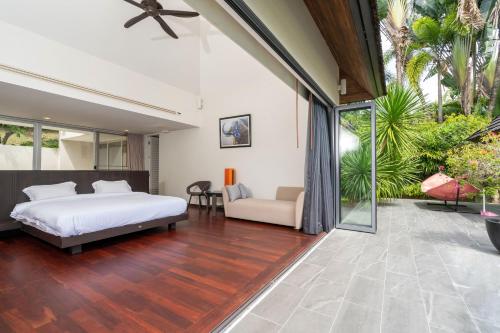 Ένα ή περισσότερα κρεβάτια σε δωμάτιο στο Villa Layan C - 3BR Villa with Private 20m Pool and Large Garden