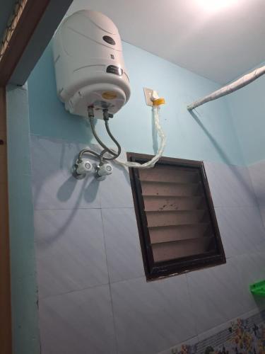 Ένα μπάνιο στο Bhavadesh Lodge