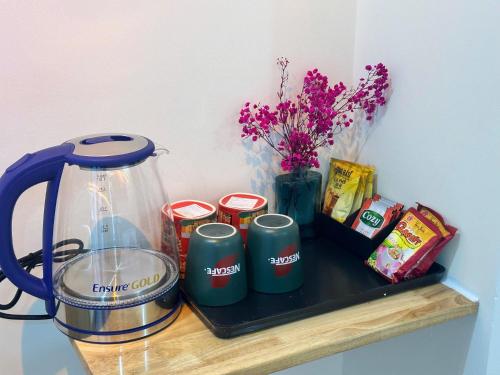 Kaffe- og tefaciliteter på Hermes Homestay IHG Spa